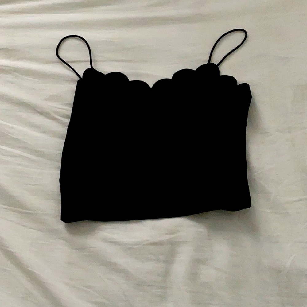 black spaghetti strap shirt.